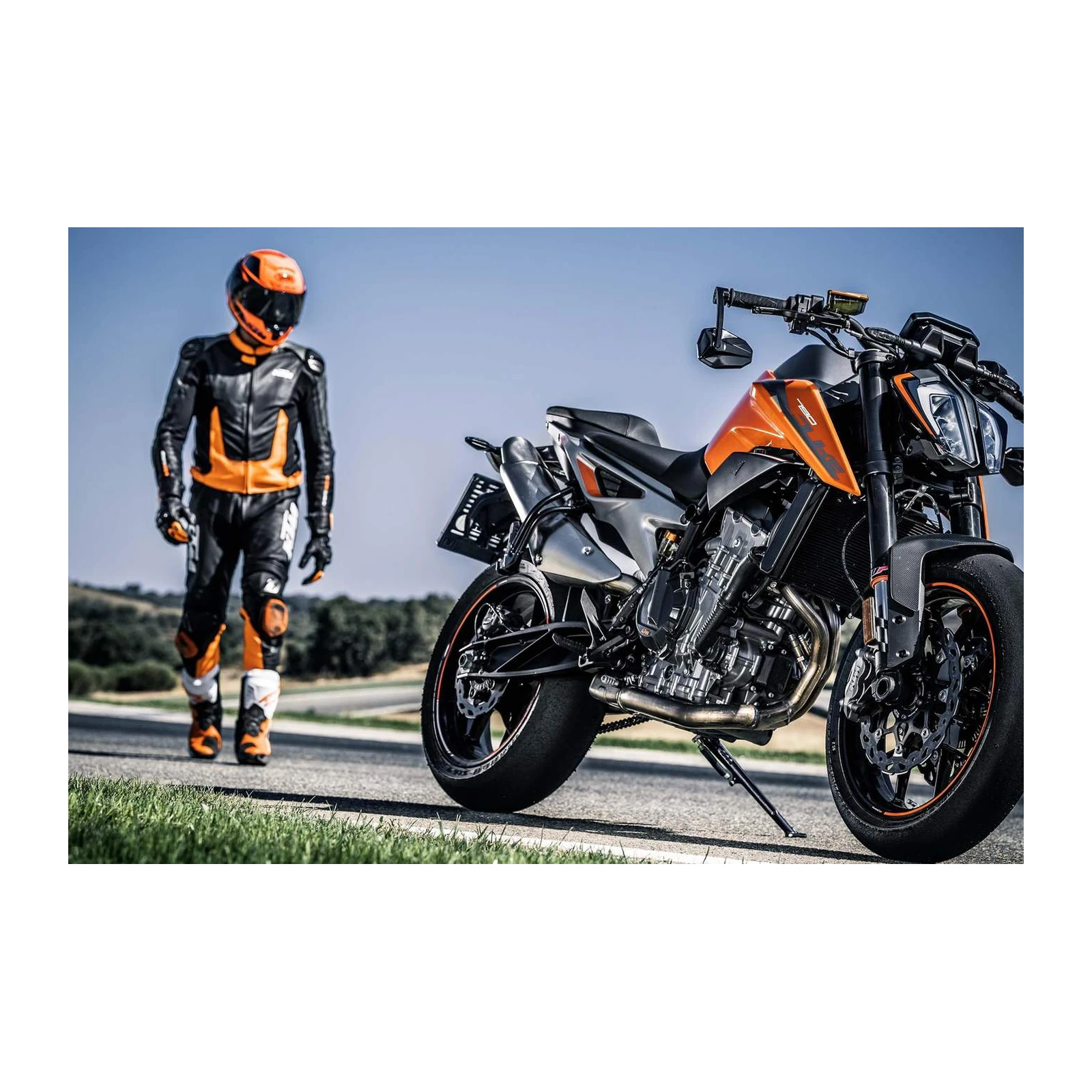 Dynamic Orange & Black Motorcycle Rider Wall Art