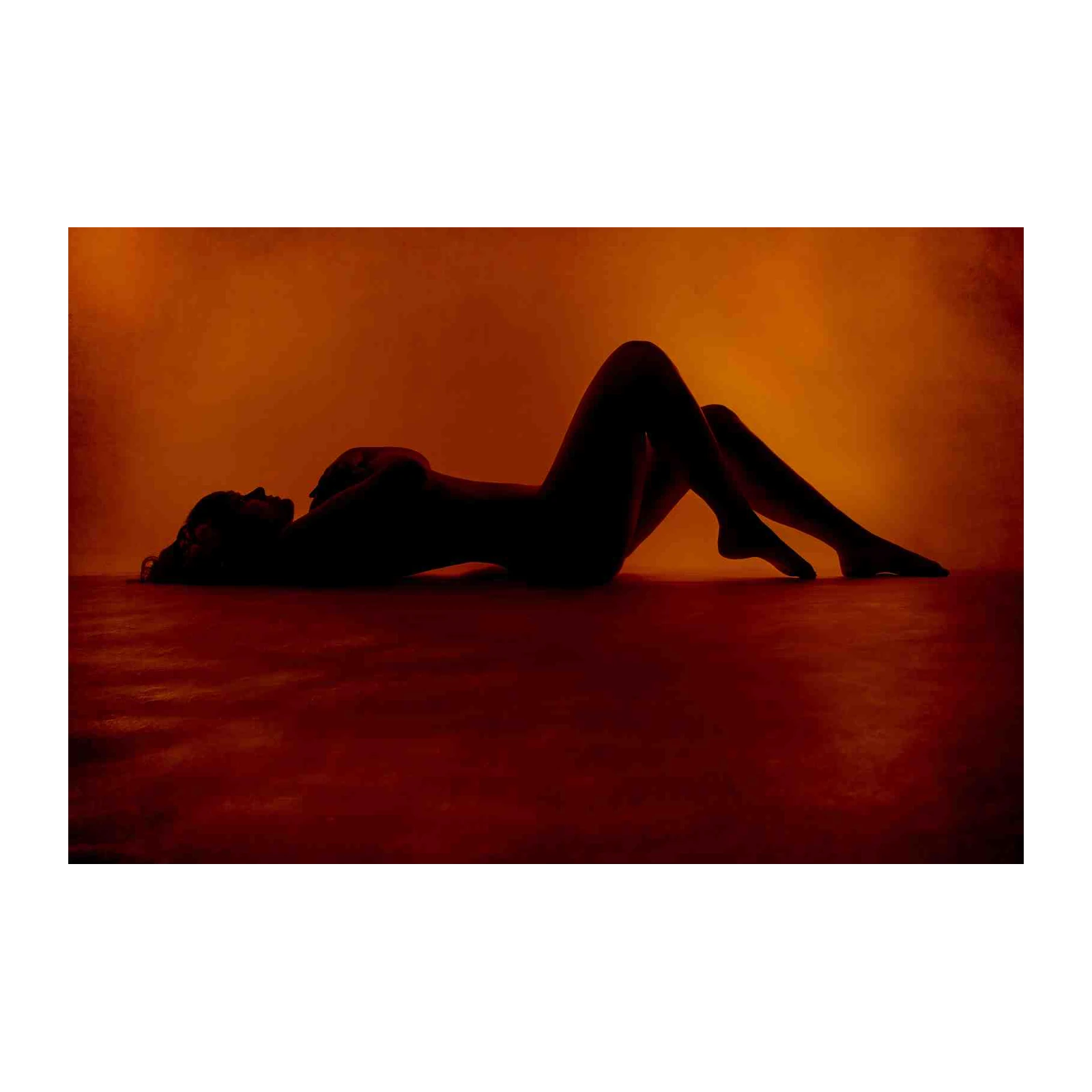 Serene Silhouette Woman Orange Glow Wall Art