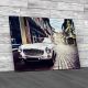 Retro Car On Old Street Canvas Print Large Picture Wall Art